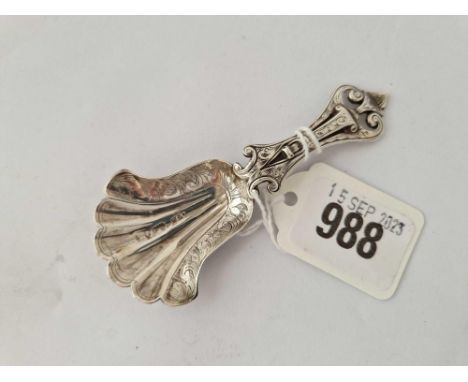 Unusual Victorian caddy spoon the stem decorated with strap work, shell bowl. Birmingham by H &amp; T