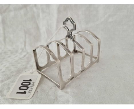 A five bar toast rack with ring handle, 3" long, Birmingham 1936