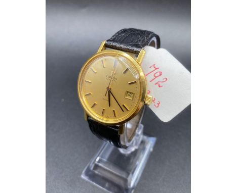 A GENTS OMEGA AUTOMATIC DE VILLE 18CT GOLD WITH SECONDS SWEEP AND DATE APERTURE W/O