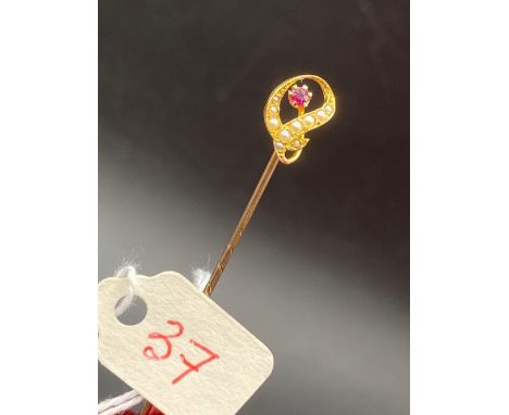 A fancy scrolled ruby and pearl stick pin 15ct gold screw top