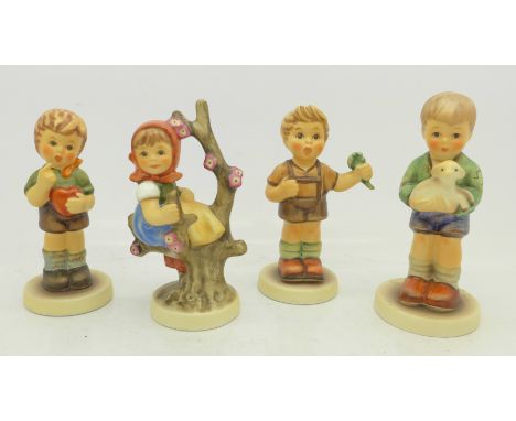 Four M J Hummel Goebel figures, boxed