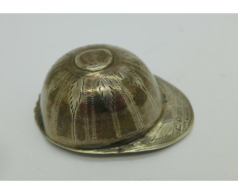A Victorian silver jockey's cap caddy spoon by George Unite, Birmingham 1844