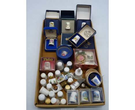 A quantity of thimbles to include; Royal Worcester, Aynsley, Souvenir, etc. Some boxed.