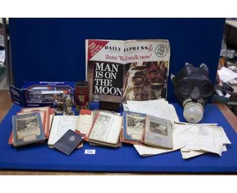 A quantity of miscellanea including gas mask, Ordnance Survey maps, boxed Corgi State Coach, two Goebel figures, etc.