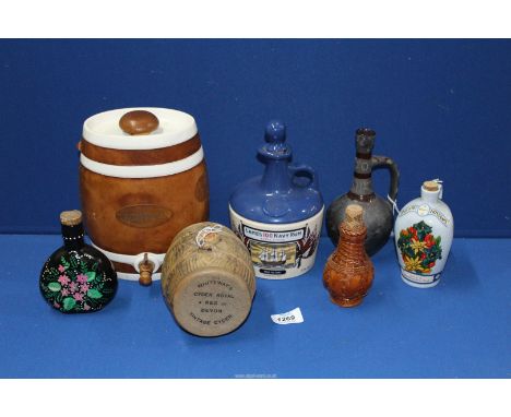 A quantity of spirit dispensers to include; Scotch Whisky barrel, Whiteway's Vintage Cyder, Deutsches Erzeugnis, Lamb's 100 N