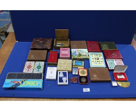 A quantity of miscellanea to include vintage playing cards, lighters, cigarette box, penknives, etc.