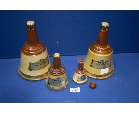Four 'Bells Scotch Whisky' decanters, corks a/f.