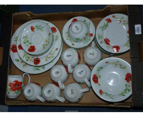 A quantity of Royal Worcester 'Poppies' teaware including cups and saucers and jugs, etc.