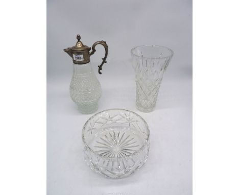 A large cut glass vase having trellis design, a cut glass fruit bowl and a claret decanter.