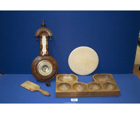 A small quantity of miscellanea to include; a Barometer and indoor Thermometer by Branna, a butter pat, bread board and woode