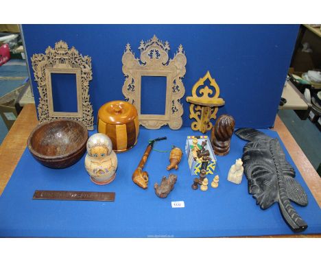 A quantity of treen including a biscuit barrel Made in Wales from elm, sycamore and walnut, set of Russian Dolls, two carved 