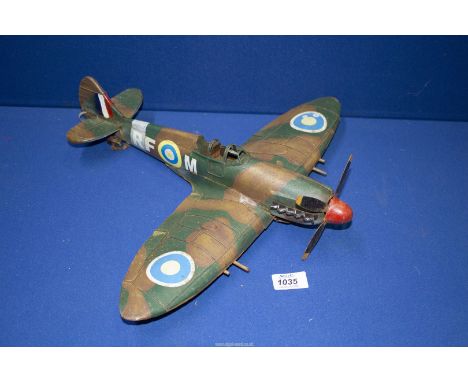 A tin plate model of a Spitfire, a/f.