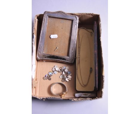 A BOX OF MIXED ITEMS, to include a silver photo frame, pearls, a mother of pearl fruit knife, silver charm bracelet with shie