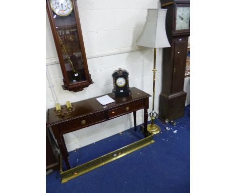 A BRASS FENDER, and a brass standard lamp with shade (2)