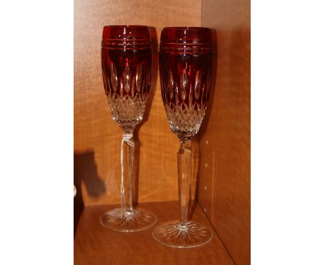 A PAIR OF RUBY FLASHED GLASS FLUTES, (2)