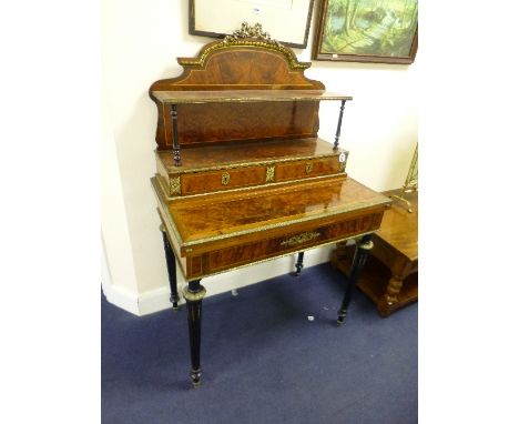 A LADIES BONHEUR DU JOUR, with string inlay, surrounding burr walnut veneer panels, two division long drawer under folding pu