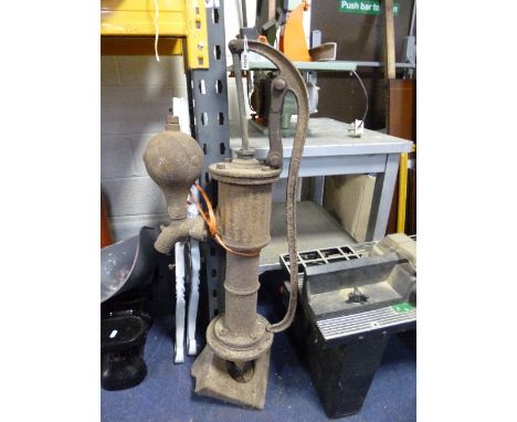 A VINTAGE CAST IRON WATER PUMP