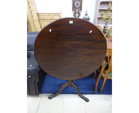 A 19TH CENTURY MAHOGANY CIRCULAR TILT TOP TRIPOD TABLE