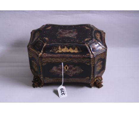 A 19TH CENTURY CANTONESE LACQUERED TEA CADDY, of shaped octagonal form having cartouches depicting figures in domestic scenes