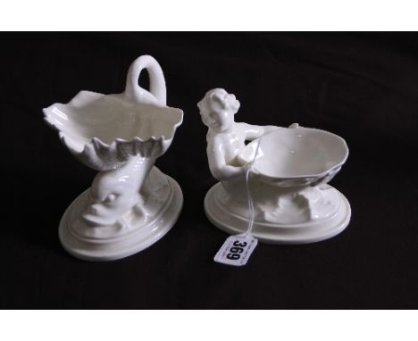 TWO ROYAL WORCESTER BLANC DE CHINE SALTS, moulded as a Merboy No.349 and a fish, green factory marks to base (2)