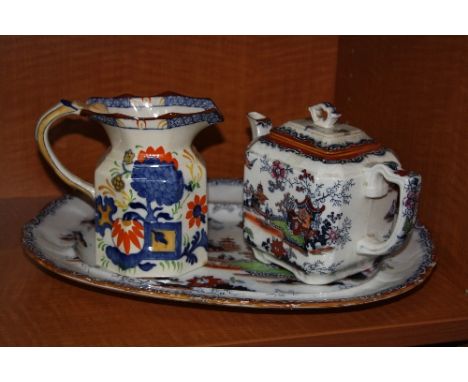 A MASONS IRONSTONE TEAPOT, printed with pagoda landscape, No.1365, a Masons octagonal jug 'Jardiniere' pattern and an Ashwort