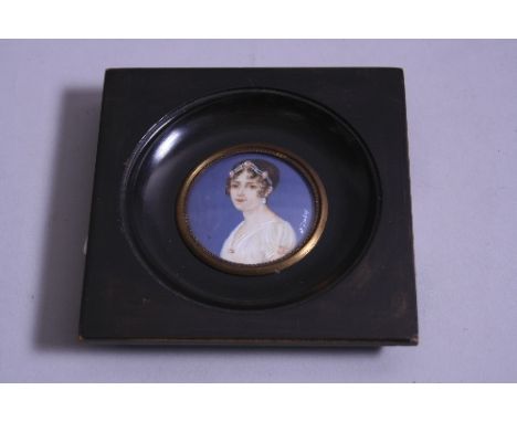 A MINIATURE PAINTED PORTRAIT OF A LADY