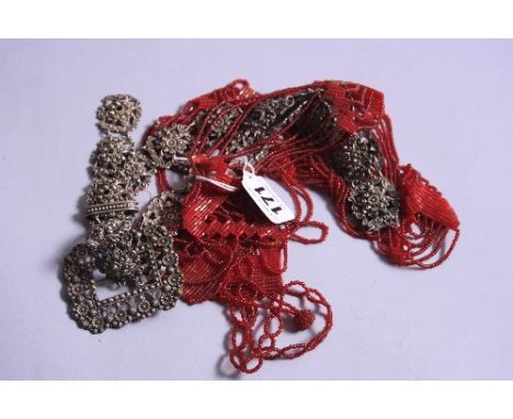 A METAL VINTAGE BELT, together with a bead belt (2)