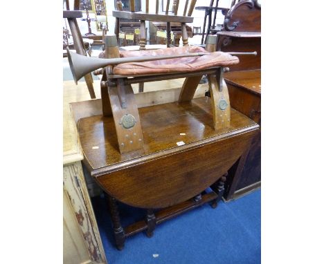 AN OAK BARLEY TWIST GATE LEG TABLE, camel stool and a copper horn (3)