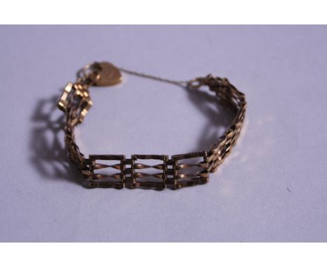 A 9CT GATE BRACELET, approximate weight 10.7 grams