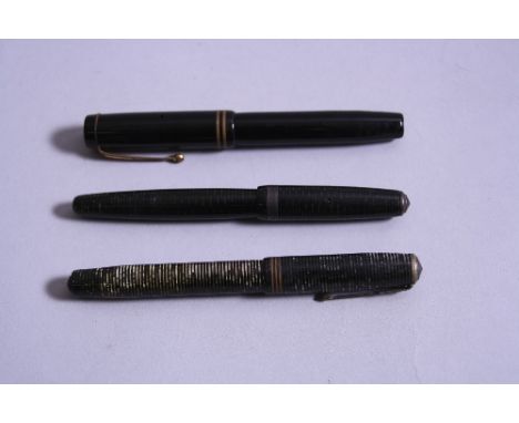 THREE VINTAGE PARKER FOUNTAIN PENS, a black and gold Duofold, a Green Stripe Vacumatic USA made and a Grey Stripe Vacumatic C