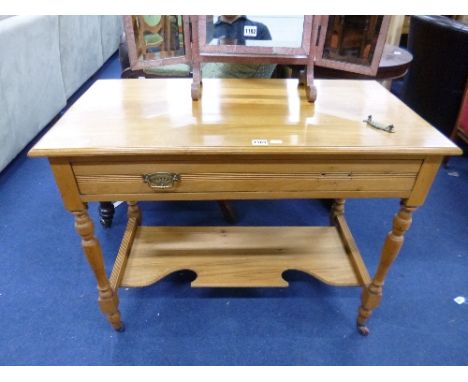 A SATINWOOD WASHSTAND/SIDE TABLE, with single long drawer and lower shelf (handle detached)