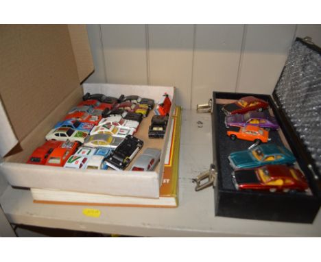 A collection of Dinky; Matchbox and other diecast models; and a Haynes car manual