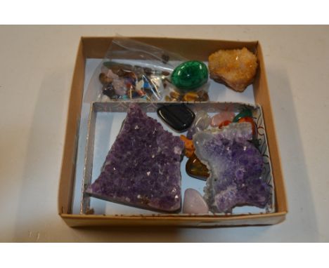 A box of Amethyst; Quartz; Malachite egg and other stones