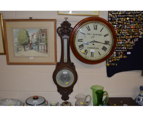 An oak cased barometer