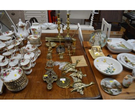A quantity of various brass ornaments, a pair of candlesticks, a light etc.