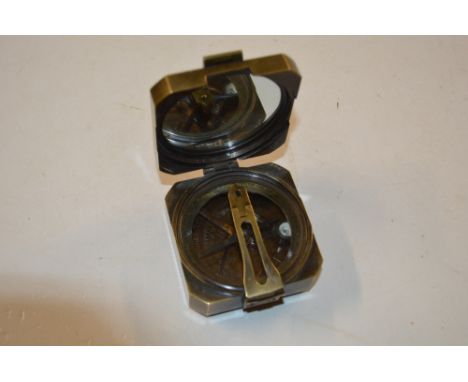 A modern brass cased compass stamped Kelvin &amp; Hughs London 1915 