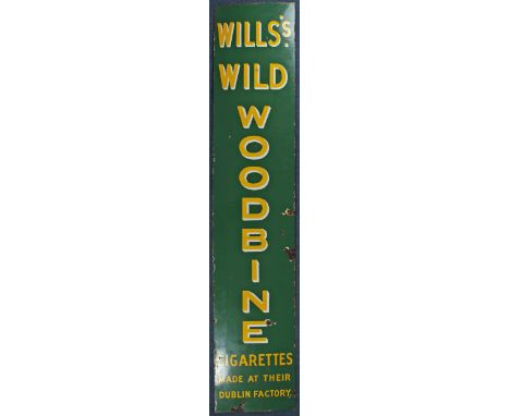Enamel metal advertising sign "Will's - Wild - Woodbine - Cigarettes - Made at Their - Dublin Factory" 88" x 18" (223 x 46cm)