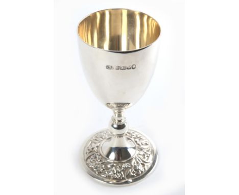 A silver goblet, , the interior gilt, the base relief decorated with roses, thistles, daffodils and shamrock, Sheffield, 1977