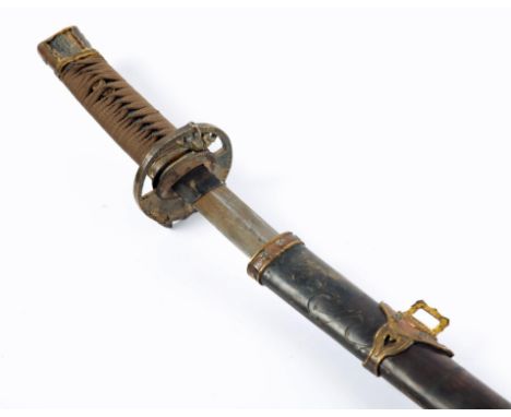 Japanese sword. A wakizashi, the hand-forged blade, 17" (43cm) long,  signed to the tang, the tsuba and hilt mounts in gilt m