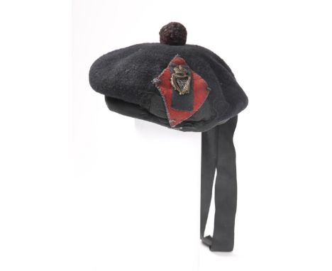 Auxiliary Division, Royal Irish Constabulary Tam o' Shanter cap. A navy-blue Tam o' Shanter with Royal Irish Constabulary bad