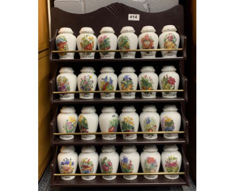 A limited edition set of Davenport porcelain spice jars and lids with rack, rack H. 64cm.