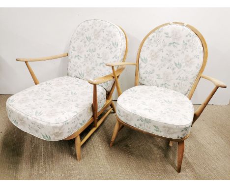 Two light elm Ercol 'Windsor' chairs with spindle backs, largest H. 80cm W. 71cm.