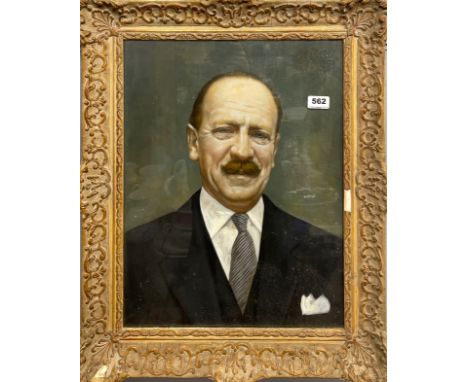 A framed oil portrait behind glass of a gentleman, frame size 54 x 64cm.