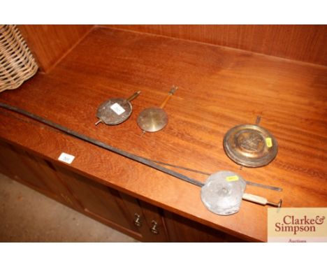 A quantity of clock pendulums to include a Russian example 