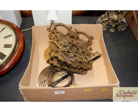 A twin musical movement clock with skeletonised dial and pendulums 