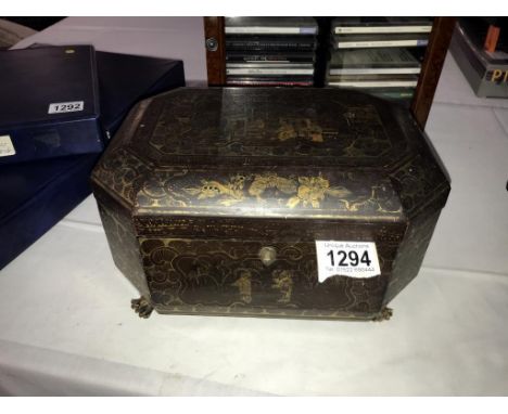 An Eastern tea caddy with 2 containers with lids, one lid missing knob and have some dents, one foot missing off bottom of ca
