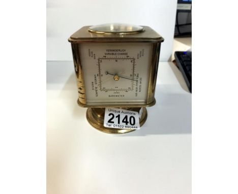 An Angelus circa 1950 Swiss gilt brass portable clock/weather station. ****Condition report**** Top The diameter of the clock