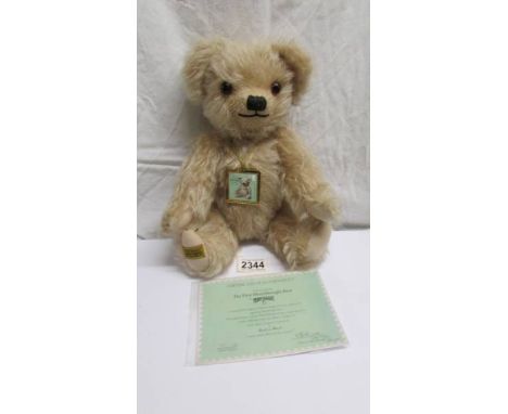 A limited edition Merrythought bear with certificate, 111/1931.