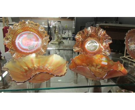 Four carnival glass bowls - Sun gold floral, English hob &amp; button, Fenton cosmos variant and one other.