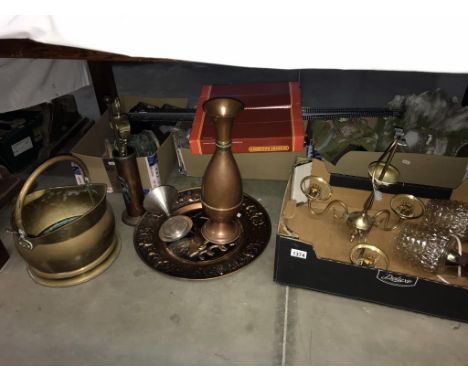 A brass coal scuttle, copper ewer, large wall plaque, brass ceiling light